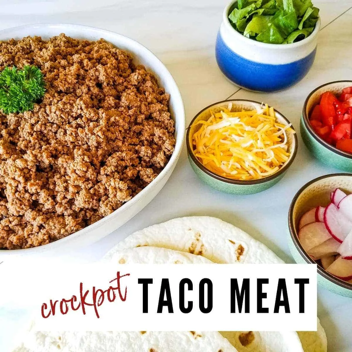 Crock pot taco meat with ingredients on separate bowls next to each other.