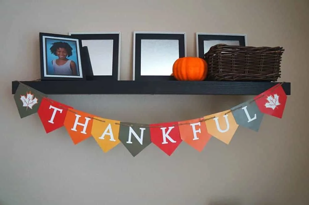 Thankful colorful banner hanging on a shelf.