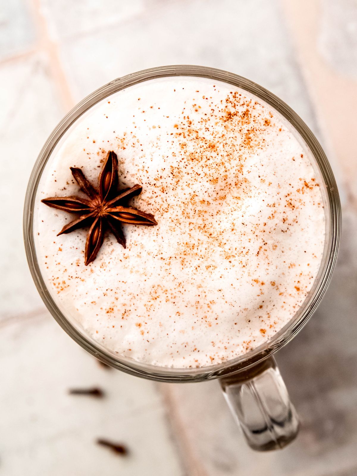 A latte with cinnamon and star anise.