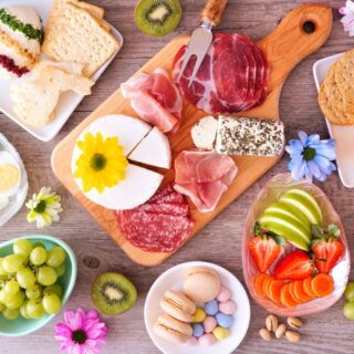 A variety of Easter food on a wooden table.