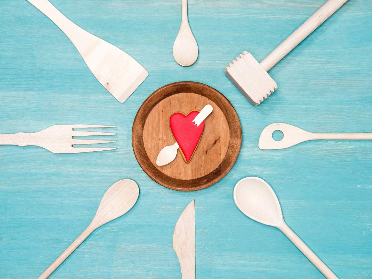 A plate of utensils with a heart on it.