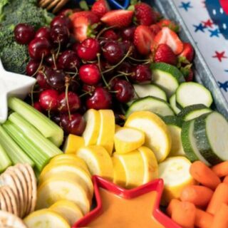 A tray of assorted fresh fruits and vegetables.