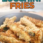 A bowl of crispy air-fried zucchini fries with a breadcrumb coating.