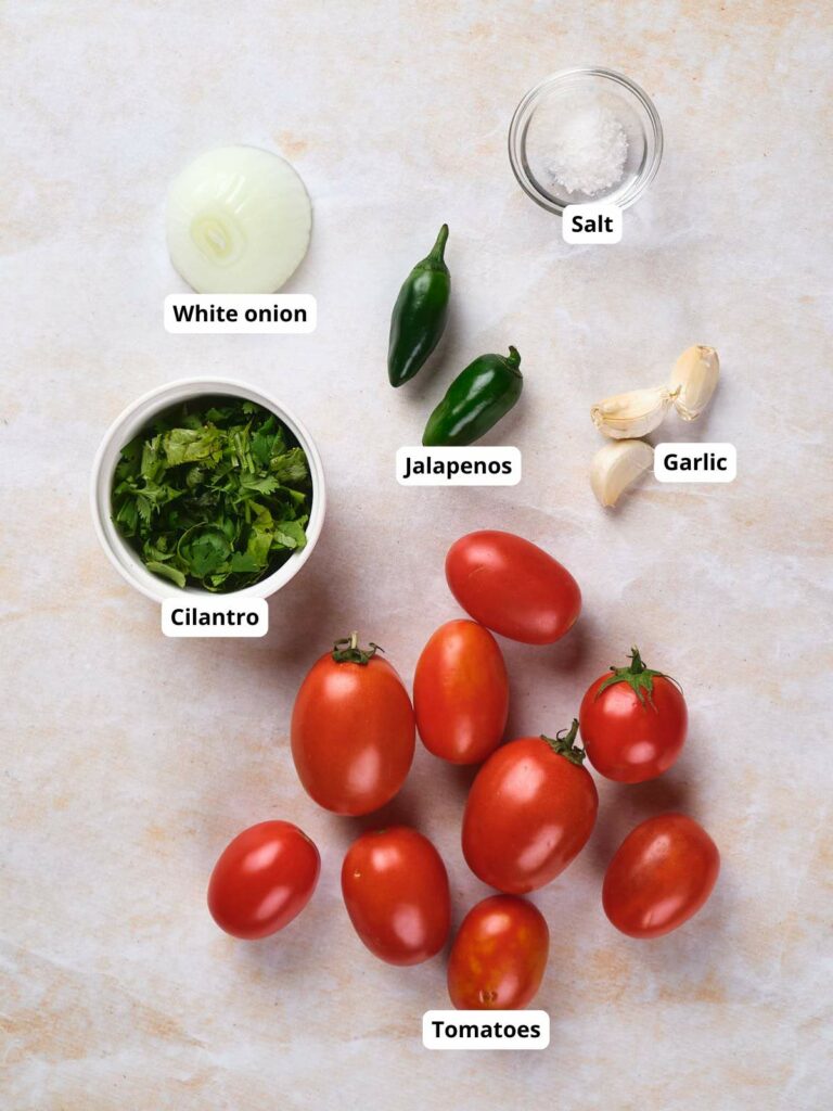 Ingredients for salsa ranchera, each label indicates the respective item.