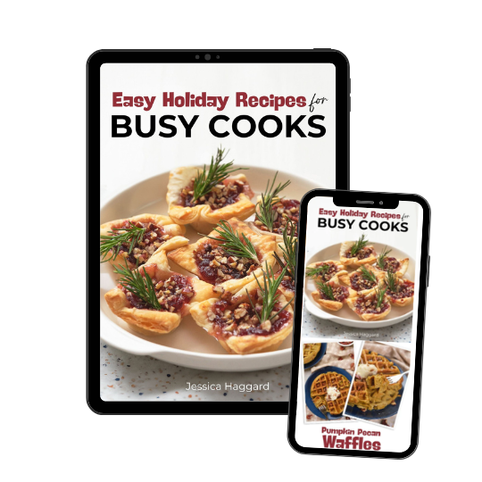 A cookbook titled "Easy Holiday Recipes for Busy Cooks" is displayed on a tablet and phone, perfect for those embracing an easy homemade life. The cover showcases appetizing dishes.