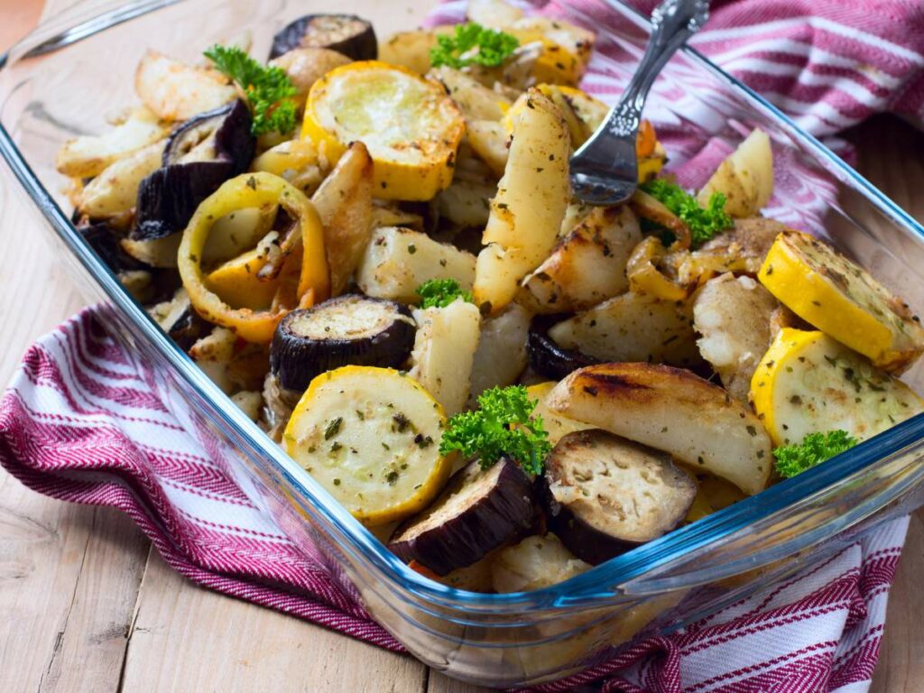 A dish filled with various roasted vegetables.