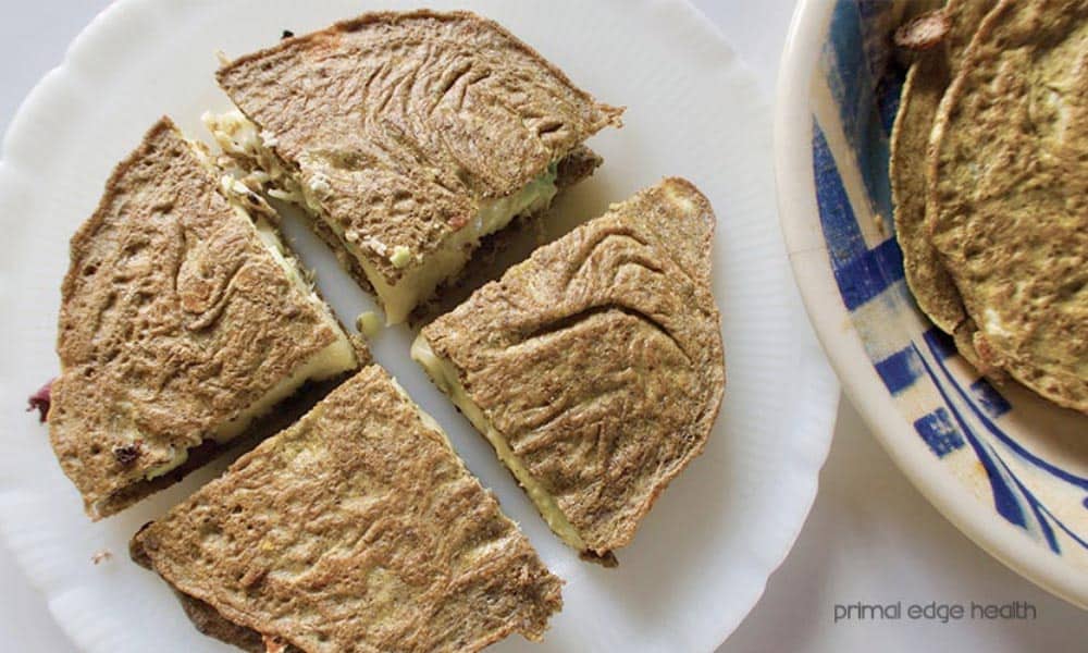 Tuna melt keto quesadilla on white plate.